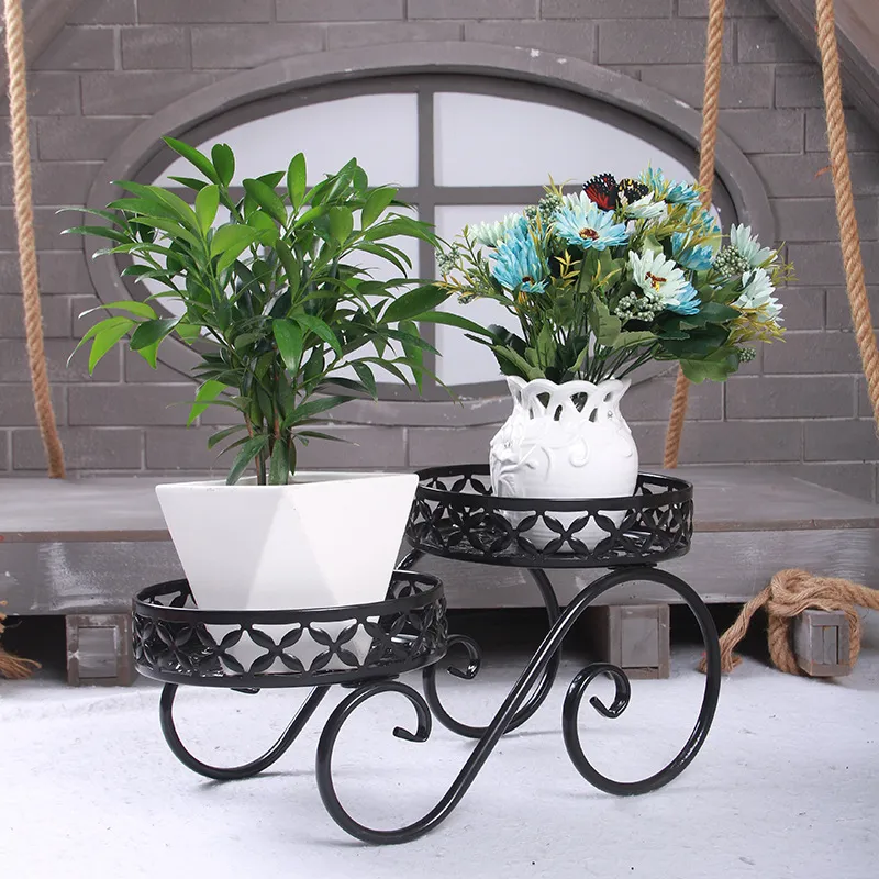 Picture of European-style iron flower pot rack High and low floor green pineapple meat pot rack Living room balcony floor type plant rack
